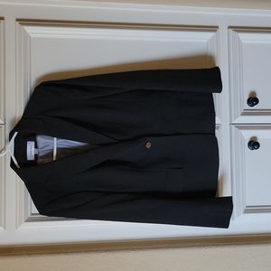Black Calvin Klein suit jacket, never worn.
